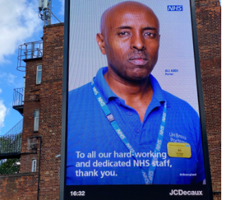 large billboard of a man banner printing